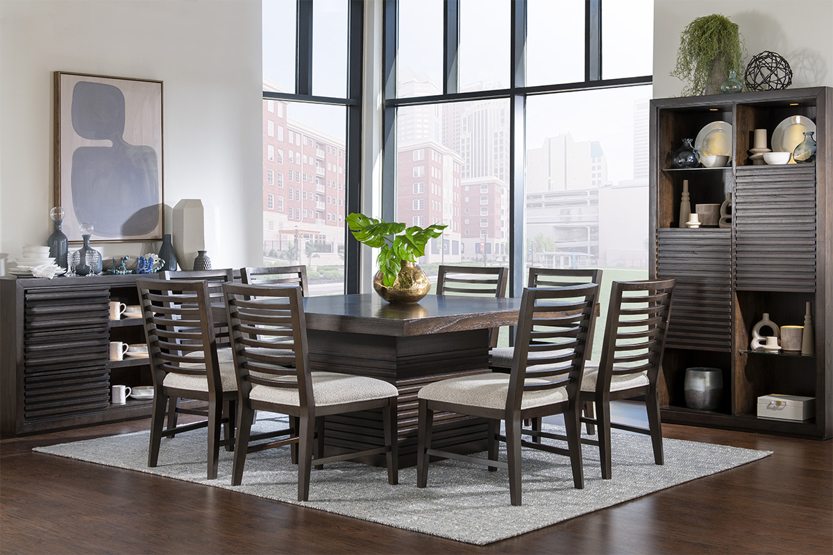 Dining room with modern artwork and barn doors